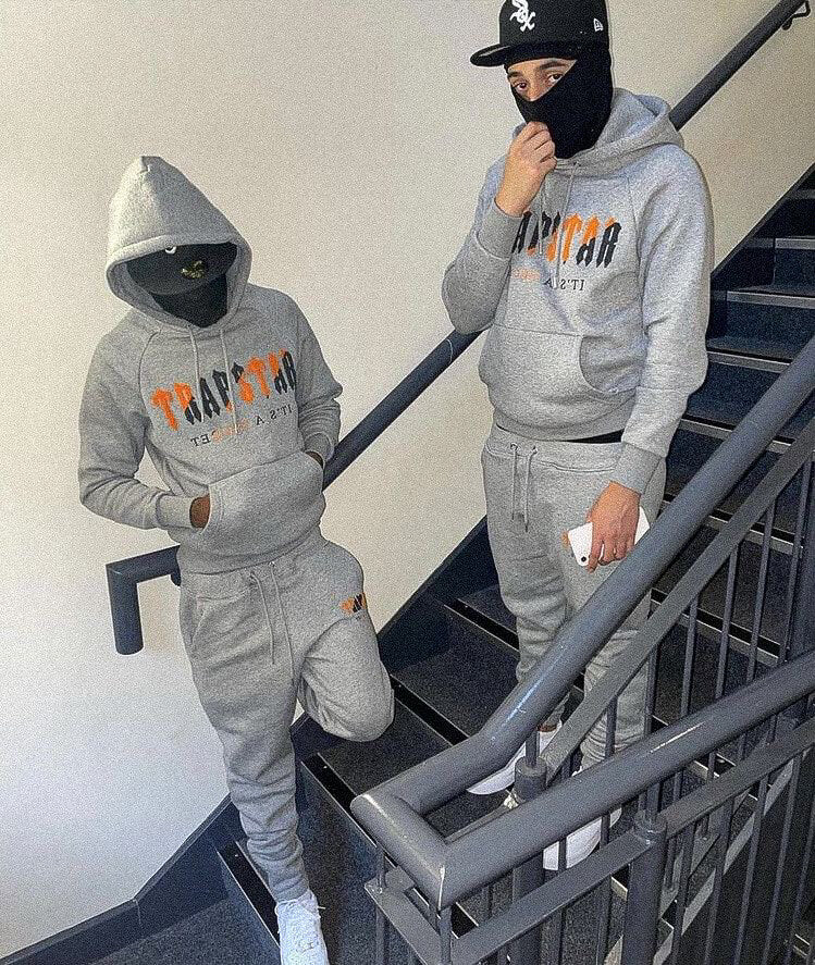 Survêtement gris orange décodé