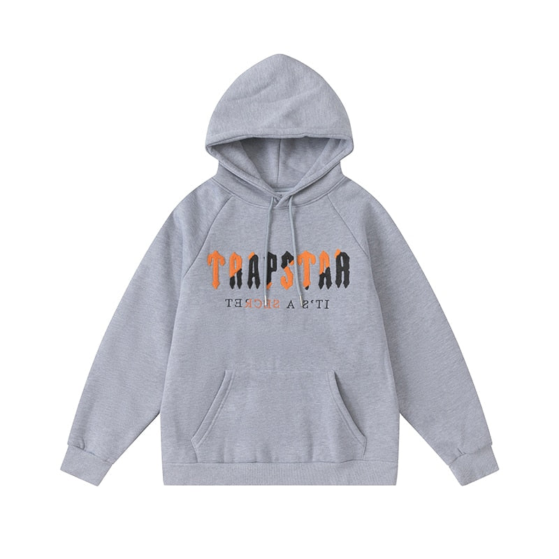 Survêtement gris orange décodé