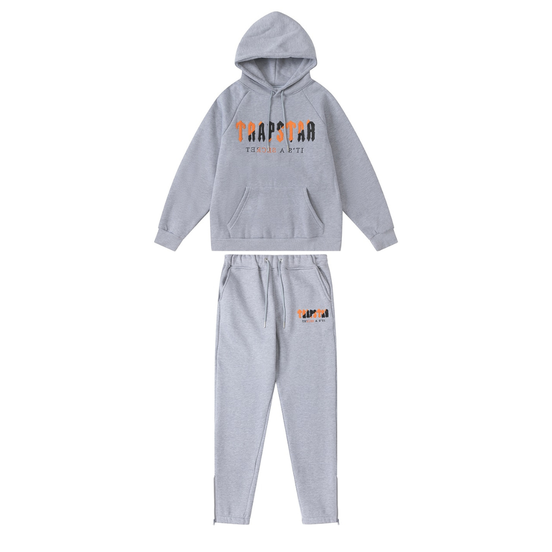 Survêtement gris orange décodé